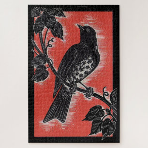 black thrush with red jigsaw puzzle