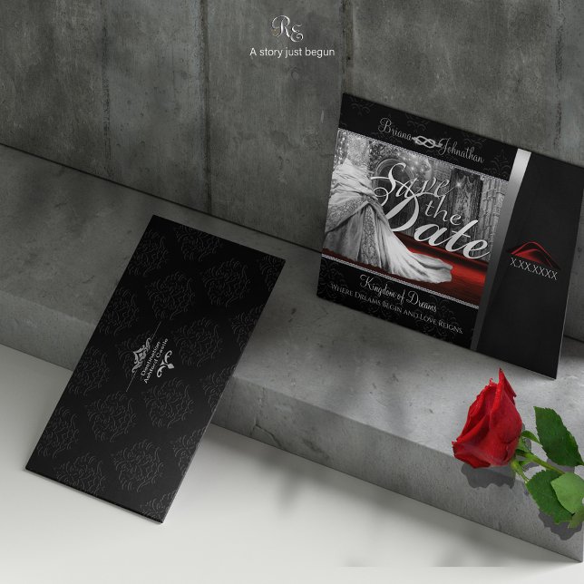 Black Tie Wedding Destination Save the Date (Card displayed on castle steps with rose, highlighting luxe ruby pocket fold and diamond love knot.)