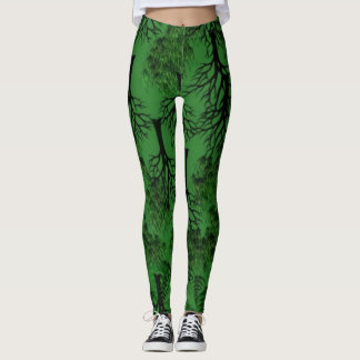 Black trees on dark green leggings