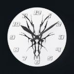 Black Tribal Deer Skull Hunting Design Round Clock<br><div class="desc">Make a bold statement with this unique, intricately detailed Deer Skull Tribal Design. Featuring a striking black and white image, this artwork reimagines the classic hunting trophy with a dark, modern edge. Perfect for deer hunters looking for gear that stands out from the traditional camo, this "scary-cool" tribal aesthetic adds...</div>