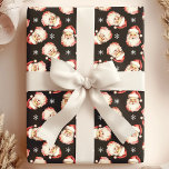 Black Vintage Santa Claus Face Watercolor Wrapping Paper<br><div class="desc">Wrap your gifts in festive cheer with our Black Vintage Santa Claus Face Watercolor Wrapping Paper! This charming design features nostalgic watercolor illustrations of Santa Claus faces set against a vibrant background, adorned with delicate snowflakes. Perfect for adding a touch of vintage charm to your holiday presents, this wrapping paper...</div>