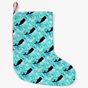 black whales on bluew small christmas stocking