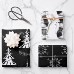 Black, White and Silver Christmas Wrapping Paper Sheet<br><div class="desc">This elegant and unique black Christmas wrapping paper set features three different, very festive designs for your Christmas gift wrapping these hoidays: a contemporary Christmas tree pattern with white Xmas trees and the greeting, 'Be Merry'; the second sheet has a whimsical pattern of cute little grey snowmen dressed in black...</div>