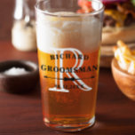 Black White Bow Tie Monogram Groomsman Wedding Glass<br><div class="desc">Beer glass favour for your groomsmen where you can personalise the beer tumbler with your groomsman's name and the date in black atop their initial in white with a bow tie divider.</div>