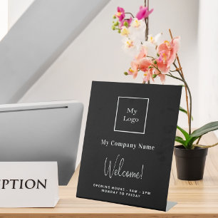Black white business logo name opening hours pedestal sign