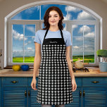 Black white chef hats pattern name apron<br><div class="desc">A black background decorated with a pattern of white chef hats.  Personalise and add a name.</div>