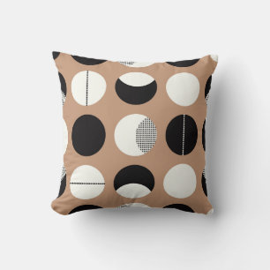 Black, white circles, brown background. cushion