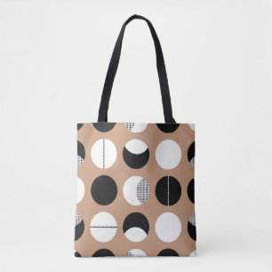 Black, white circles, brown background. tote bag