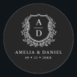 Black White Crest Modern Monogram Wedding  Classic Round Sticker<br><div class="desc">Add a timeless and elegant touch to your wedding with the Black White Crest Modern Monogram Wedding Classic Round Sticker. Featuring a sleek black background, a refined white crest design, and a personalised monogram, this sticker is perfect for enhancing your wedding invitations, favours, or stationery. Its minimalist yet sophisticated design...</div>