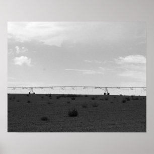 Black & White Farm Irrigation Sprinkler On a Hill  Poster