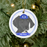 Black & White German Shorthaired Pointer Hanukkah Ceramic Ornament<br><div class="desc">Celebrate your favourite mensch on a bench with personalised ornament! This design features a sweet illustration of a black and white german shorthaired pointer dog with a blue and white yarmulke. For the most thoughtful gifts, pair it with another item from my collection! To see more work and learn about...</div>
