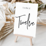 Black & White Hand Scripted Table TWELVE Table Number<br><div class="desc">Simple and chic table number cards in classic black and white make an elegant statement at your wedding or event. Design features "table [number]" in an eyecatching mix of classic serif and handwritten script lettering. Design repeats on both sides. Individually numbered cards sold separately; order each table number individually from...</div>