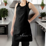 Black White Modern Minimalist Elegant Monogram Apron<br><div class="desc">Introducing our Black and White Minimalist Modern Monogram Collection: Embrace simplicity and sophistication with our minimalist designs, curated to elevate your style effortlessly. Crafted with a keen eye for modern aesthetics, this collection features sleek black and white designs accentuated by personalised monograms. From chic stationery to versatile accessories, our collection...</div>