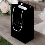 Black White Modern Minimalist Monogram Name Small Gift Bag<br><div class="desc">Present your gifts in style with our Black and White Modern Minimalist Monogram Name Gift Bag. This elegant bag boasts a clean and contemporary design, featuring a customisable monogram that adds a personalised touch to your gift-giving. Crafted with quality in mind, this bag is both sophisticated and minimalist, making it...</div>
