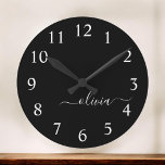 Black White Modern Script Girly Monogram Name Round Clock<br><div class="desc">Black and White Simple Script Monogram Name Clock. This makes the perfect sweet 16 birthday,  wedding,  bridal shower,  anniversary,  baby shower or bachelorette party gift for someone that loves glam luxury and chic styles.</div>