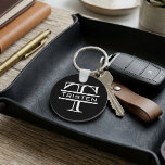 Black White Monogram Classic Name Key Ring<br><div class="desc">This design was created from my one-of-a-kind fluid acrylic painting. It may be personalised by clicking the customise button and changing the name, initials or words. You may also change the text colour and style or delete the text for an image only design. Contact me at colorflowcreations@gmail.com if you with...</div>