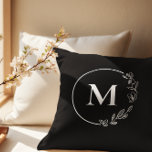 Black White Monogram Floral wreath personalised Cushion<br><div class="desc">Add a touch of elegance to your home decor with our Black White Monogram Floral wreath personalised throw pillow! This stylish accent piece combines classic monogramming with a contemporary floral wreath design, creating a timeless addition to any living space. Made from high-quality materials, each pillow is soft, comfortable, and built...</div>