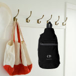 Black white monogram initials name sling bag<br><div class="desc">Black background,  white text. Personalise and add your monogram initials and full name.</div>