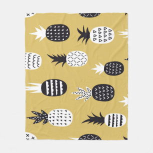 Black, white pineapples, yellow background fleece blanket