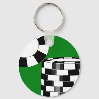 Black white poker chips on green key ring