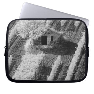 Black & White view of small stone barn Laptop Sleeve