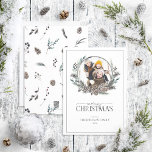 Black Winter Berry Wreath Merry Christmas Photo Ho Holiday Card<br><div class="desc">Looking for a beautiful, simple, and elegant holiday card? Look no further than our Black Winter Berry Wreath Merry Christmas Photo Holiday Card! This stunning card features a modern, black and white wreath adorned with botanical elements like pine cones and berries, surrounding your photo. 'Merry Christmas' is written in a...</div>