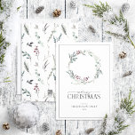 Black Winter Botanical Wreath Merry Christmas Holi Holiday Card<br><div class="desc">What better way to spread holiday cheer than with our Black Winter Botanical Wreath Merry Christmas Holiday Card? This beautiful card features a modern and winter greenery wreath beautifully decorated with dark black, red and desaturated green winter botanicals. The word "Merry" is elegantly written in a script font, making this...</div>