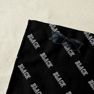 Black With Grey Text On Black Solid Colour Beach Towel