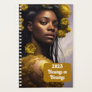 Black woman white roses and gold embellishments planner