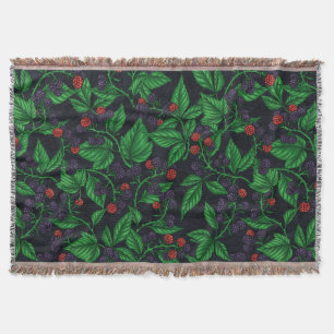 Blackberries on dark grey throw blanket