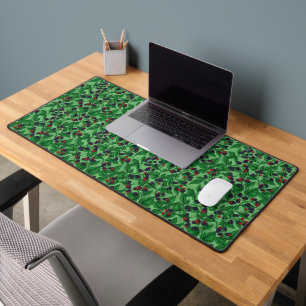 Blackberries on green desk mat