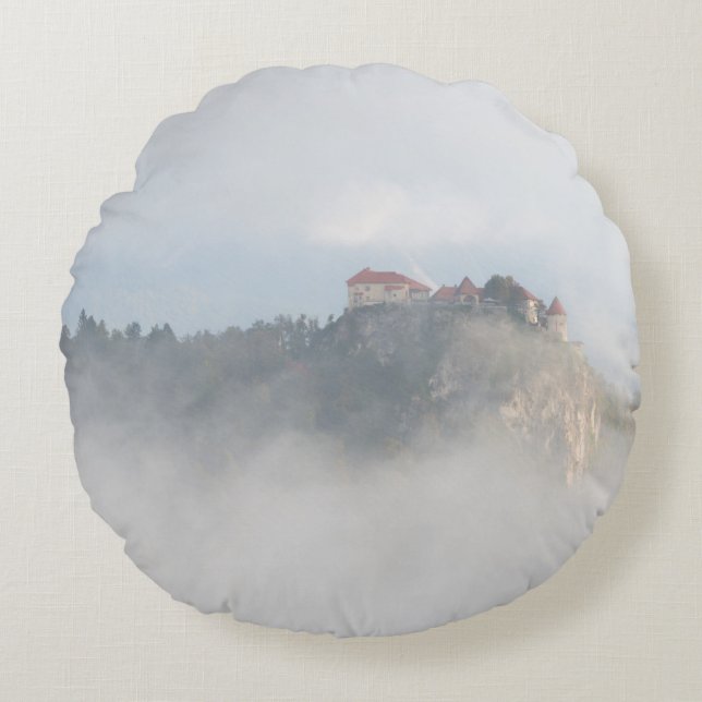 Bled castle surrounded by clouds round cushion (Front)