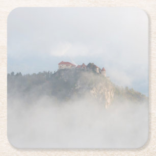 Bled castle surrounded by clouds square paper coaster
