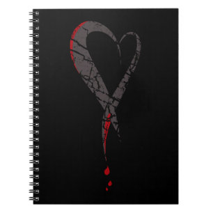 Bleeding heart. Wounded sad heart. Darkness. Notebook