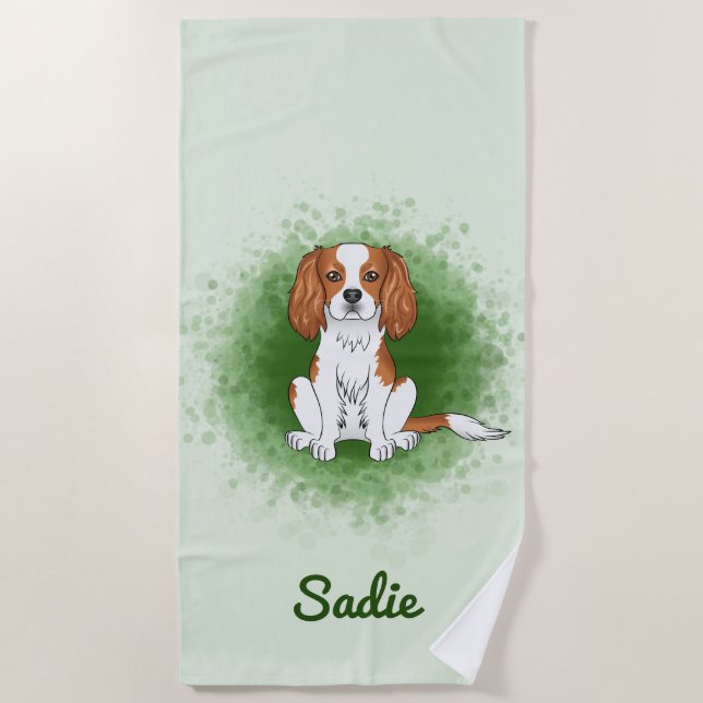 Blenheim Cavalier King Charles Spaniel On Green Beach Towel (Front)