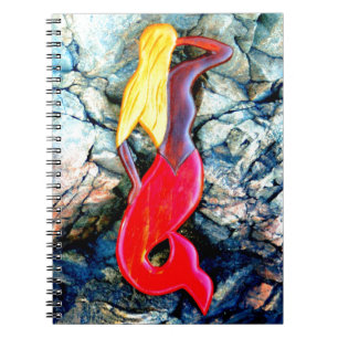 blonde mermaid in red notebook