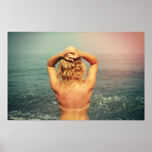 Blonde woman at the beach poster