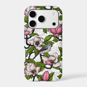 Blooming magnolia and titmouse bird