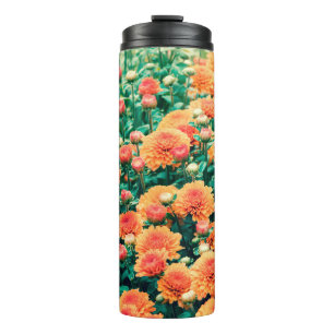 Blossoming flowers in a gardenautumn, background, thermal tumbler