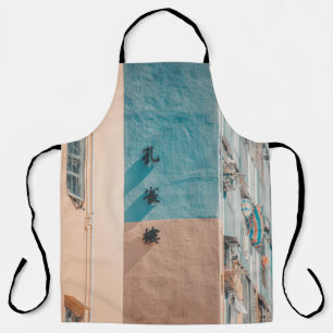 BLUE AND BEIGE WALL WITH KANJI SIGNAGE APRON