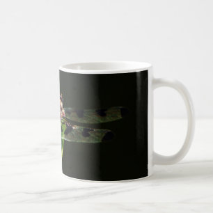 Blue and black  Dragonfly on green and red grass Coffee Mug