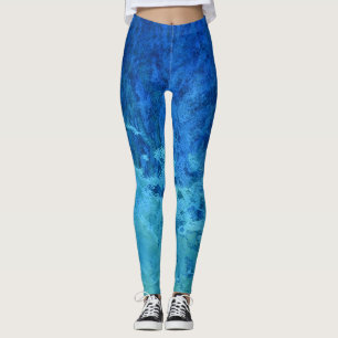 blue and green abstract stained glass pattern leggings