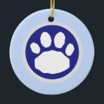 Blue and Grey Paw Print Ceramic Ornament<br><div class="desc">This round keepsake ornament features a large animal paw print in colours inspired by the Hanukkah season. Make it uniquely yours by adding a name or your customised message. See more gift ideas for your favourite four-legged friends and their pet parents at zazzle.com/paws_for_celebration . Pin or bookmark this page to...</div>