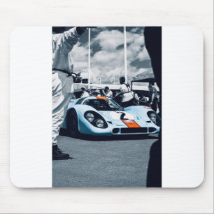 Blue and orange race car mouse pad