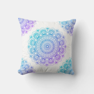 Blue and purple floral mandala on white background cushion