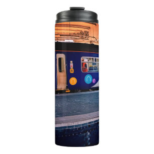 Blue and silver thermal tumbler