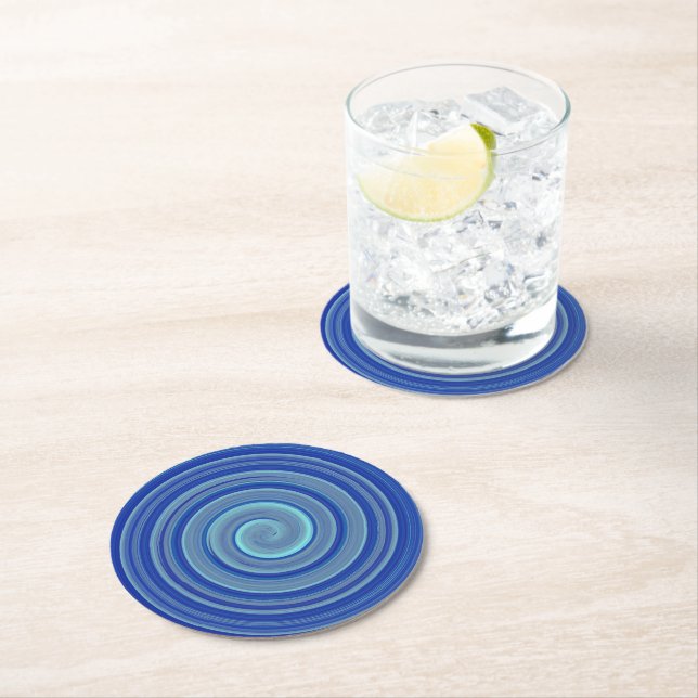 Blue and turquoise spiral round paper coaster (Insitu)