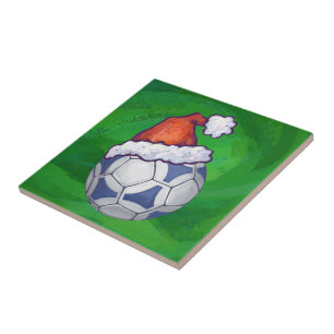 Blue and White Festive Soccer Ball on Green Ceramic Tile