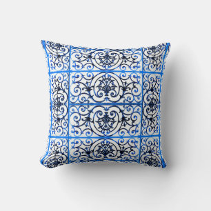 Blue and white scrollwork pattern cushion
