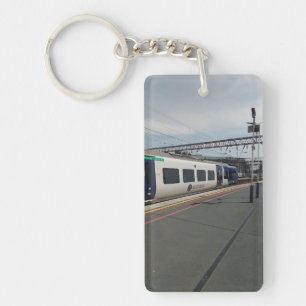 Blue and white train key ring